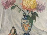 a painting of a vase with flowers in it and a buddha fig next to it