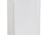 a white washing machine sitting on top of a white counter