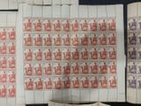 two pages of stamps with a picture of a man and a woman on them