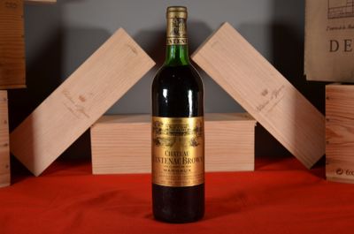 a bottle of wine that is sitting on a table