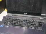 a laptop computer sitting on top of a white desk