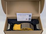 a box with a yellow car inside of it