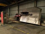a large machine that is sitting inside of a building