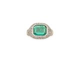 an emerald and diamond ring
