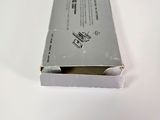 a white box with a small electronic device inside of it