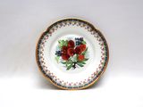 a plate with fruit on it sitting on a table