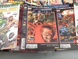 a lot of comic books sitting on a table