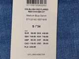 the label on the back of a pair of blue jeans