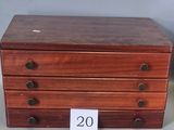 an old wooden chest of drawers with a price tag on it