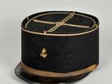 an image of a black hat with a gold cross on it
