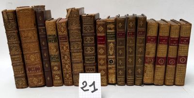 a lot of old books that are sitting on a table