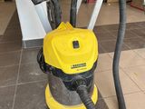 a yellow and black vacuum cleaner sitting on top of a tiled floor