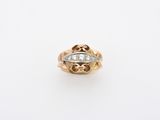 an image of a gold ring with a diamond in the center