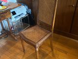 a chair that is sitting in the middle of a wooden floor
