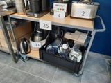 many different types of coffee machines on the shelf