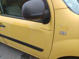 a small yellow car parked on the side of the road