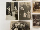 several old black and white photographs of people and children