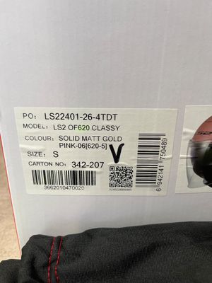 the back of a pair of black jeans with a red stitching on the side