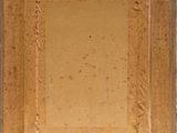 painting of a brown square with a white border on a tan wall