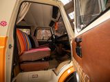 a van that has a seat in the back of it