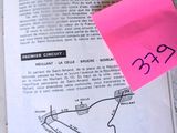 a pink post - it note with a picture of a map on it