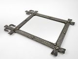 an image of a metal frame with a decorative design on it
