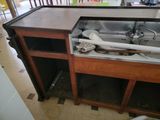 a sink that is under the counter in the kitchen