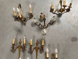 an image of a bunch of chandeliers that are on a table