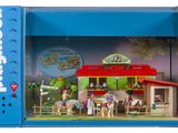 un ensemble Playmobil dans une boîte bleue comprenant un cheval et une calèche