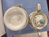 two cups that are sitting next to each other on a table