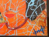 a picture of a picture of a woman with a red necklace