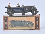 a toy car sitting on top of a box on a table