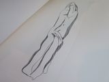 someone is drawing a picture on a piece of paper with a pencil