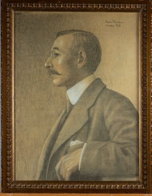 portrait of a man in a suit and tie in a wooden frame