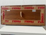 a wooden box that is sitting on top of a table