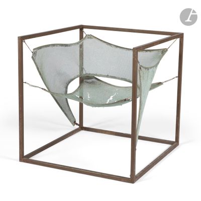 a metal frame with a chair inside of it on a white background