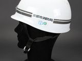 a close up of a white hard hat on a mannequin head