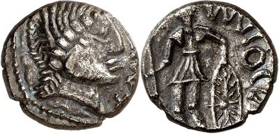 a silver coin with an image of a man on it