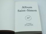 an open book with a picture of a saint - simon logo on it