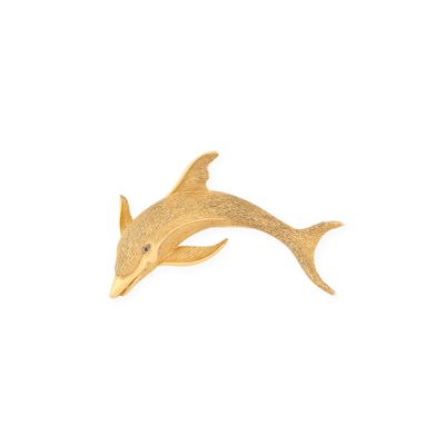 figurine de dauphin plaquée or sur fond blanc
