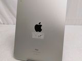 a close up of the back of an ipad with a sticker on it