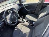 the interior of a car with a steering wheel and a dashboard