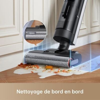 une photo d'un aspirateur sans fil posé sur le sol