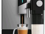 une image d'une machine à café avec une tasse de café