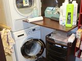 a washer and dryer in a small room