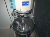 a mixer that is sitting on a stand in a room