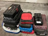 many pieces of luggage stacked on top of each other