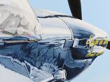 a painting of an airplane painted on the side of a building