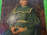 painting of a young boy in a green dress sitting in a chair