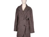 the coat is made of wool and has buttons on the front
